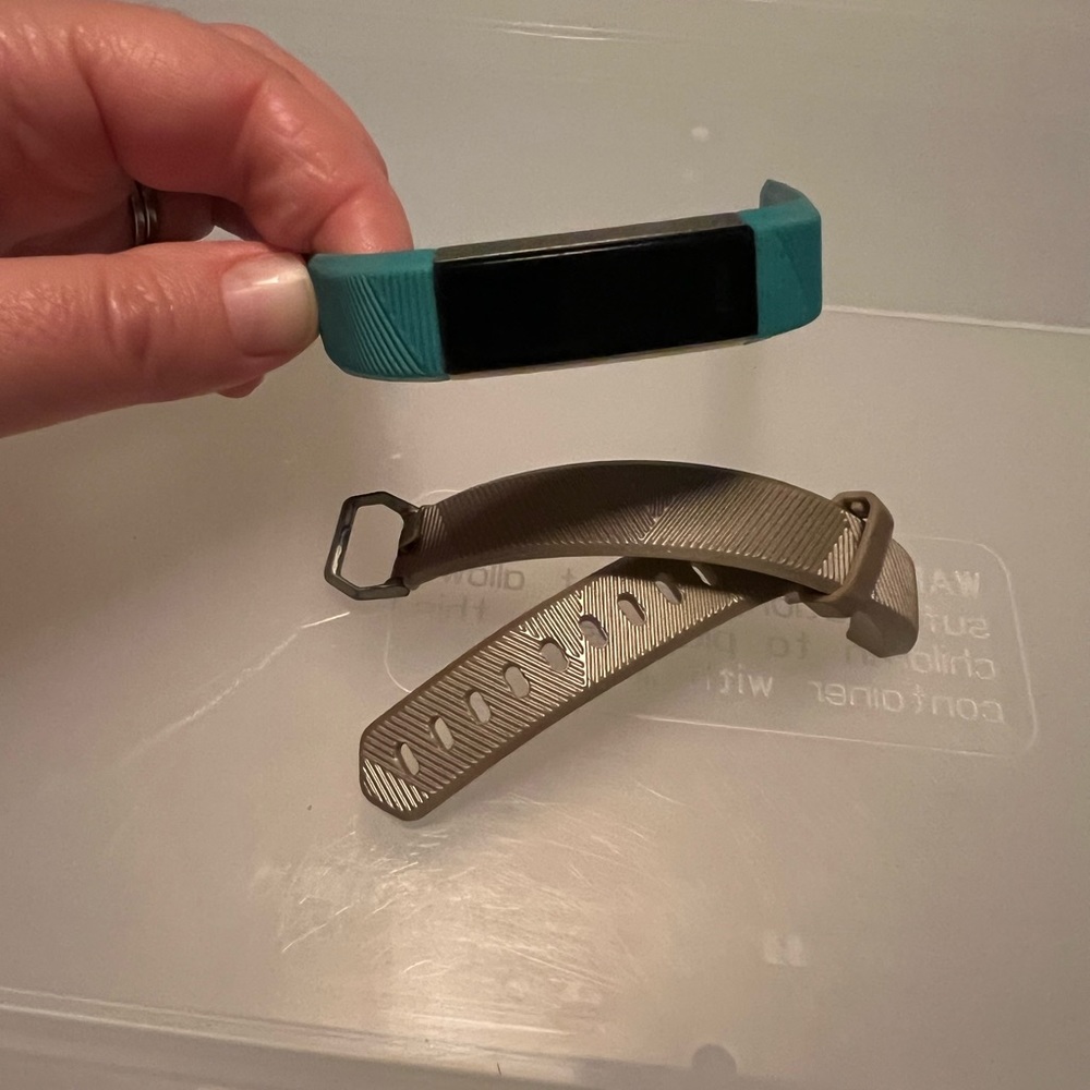 Fitbit Alta watch with 2 bands